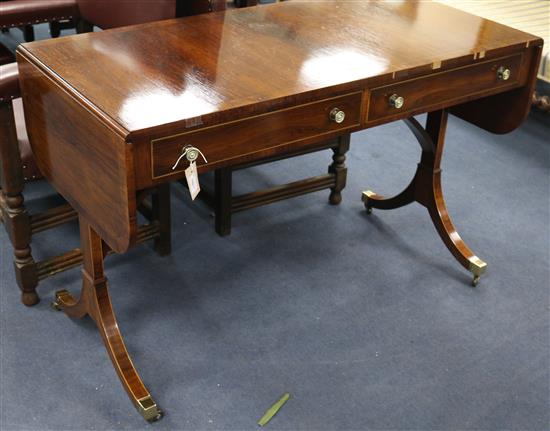 A pair of George III style rosewood sofa tables W.114cm